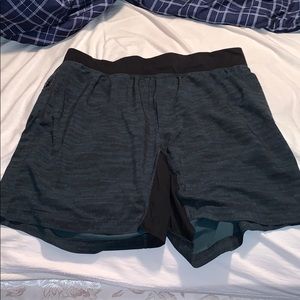 Men’s Lulu shorts w/ back zipper pocket. 7” inseam